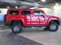 2006 Victory Red Hummer H3   photo #3