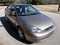 2004 Arizona Beige Metallic Ford Focus SE Sedan  photo #11