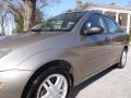 2004 Arizona Beige Metallic Ford Focus SE Sedan  photo #16