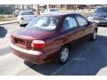 2001 Classic Red Kia Sephia   photo #4