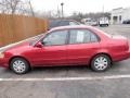 2001 Impulse Red Toyota Corolla LE  photo #1