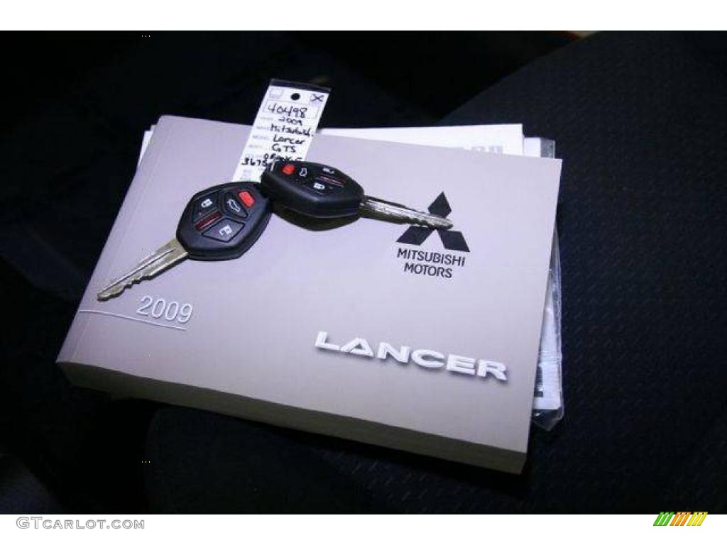 2009 Lancer GTS - Rotor Glow Orange Metallic / Black photo #40