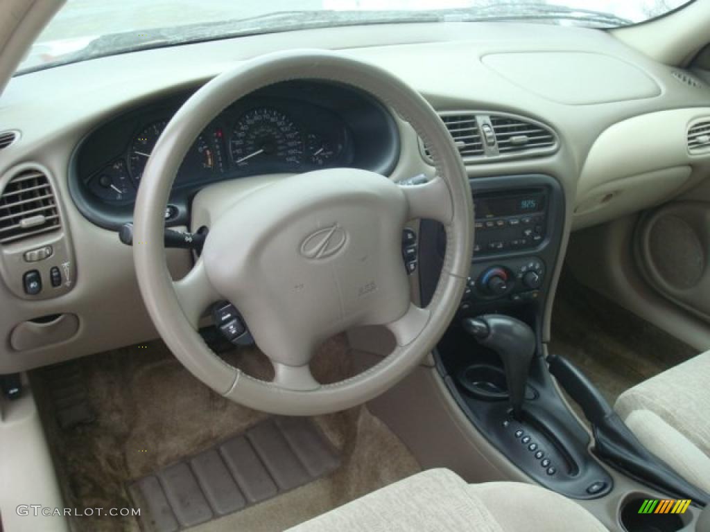 2003 Alero GL Coupe - Ruby Red Metallic / Neutral photo #10