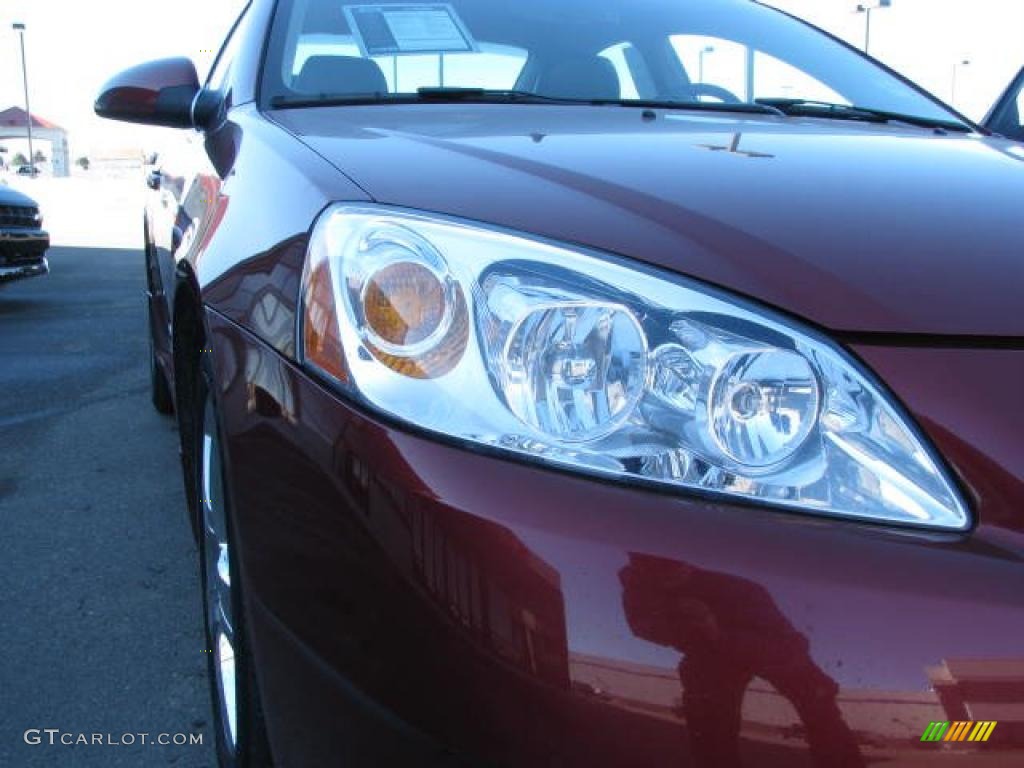 2009 G6 GXP Sedan - Performance Red Metallic / Ebony photo #4