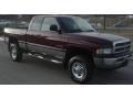 2001 Dark Garnet Red Pearl Dodge Ram 2500 SLT Quad Cab 4x4  photo #1