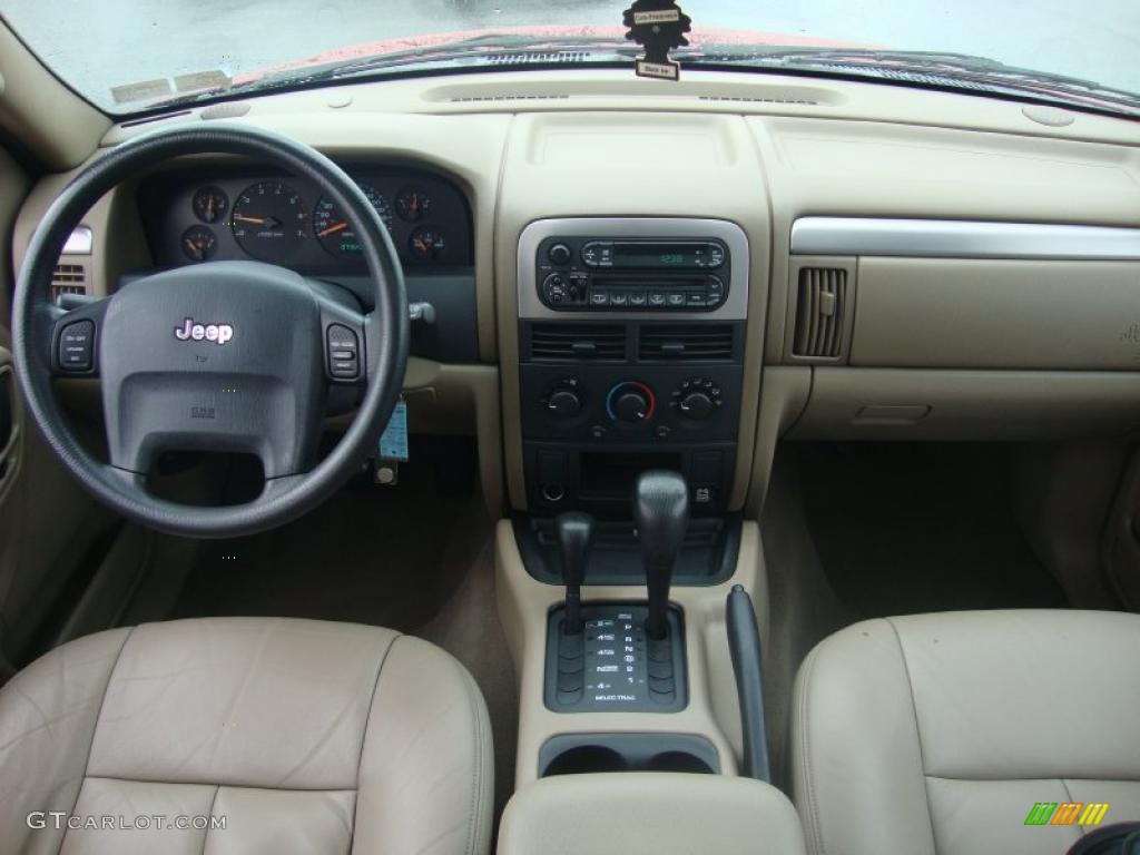 2003 Grand Cherokee Laredo 4x4 - Inferno Red Tinted Pearlcoat / Sandstone photo #30