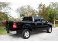 2004 Black Ford F150 Lariat SuperCrew 4x4  photo #11