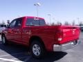 2010 Flame Red Dodge Ram 1500 SLT Quad Cab  photo #2