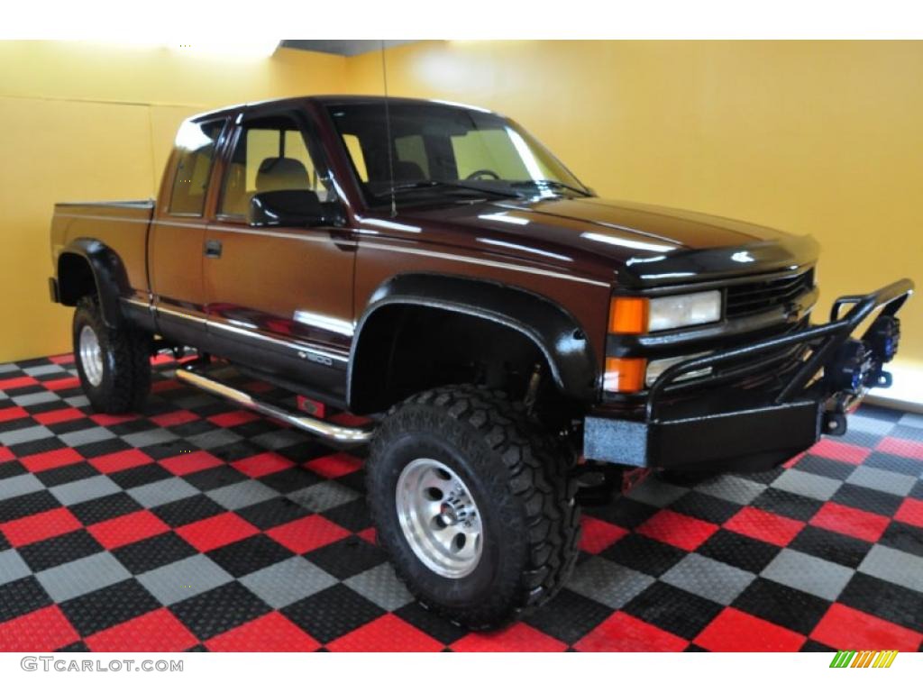 1999 Silverado 1500 LS Extended Cab 4x4 - Dark Carmine Red Metallic / Red photo #1
