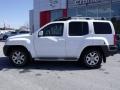 2010 Avalanche White Nissan Xterra SE  photo #2