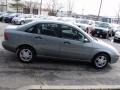 2004 Liquid Grey Metallic Ford Focus SE Sedan  photo #4