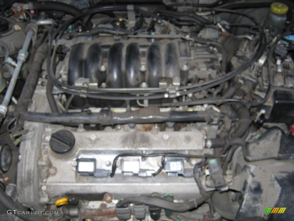 2000 Maxima SE - Super Black / Frost photo #9