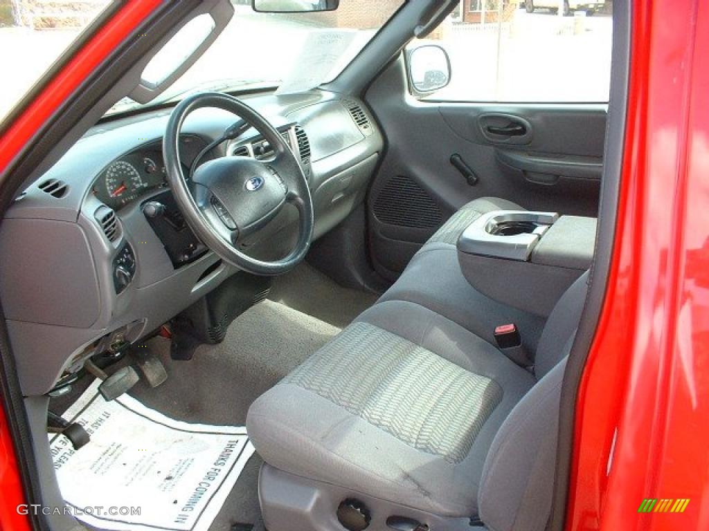 2003 F150 STX Regular Cab - Bright Red / Dark Graphite Grey photo #5