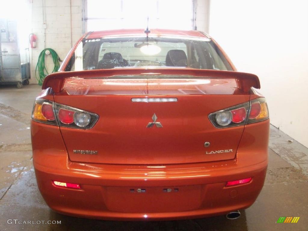 2010 Lancer GTS - Rotor Glow Orange Metallic / Black photo #7