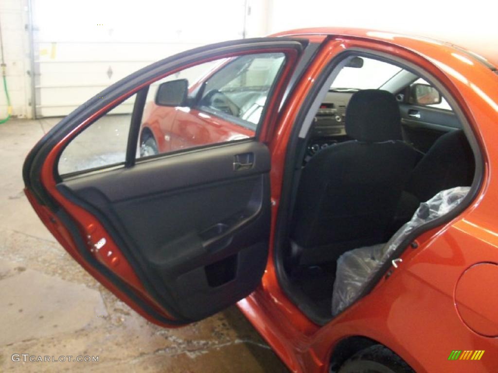 2010 Lancer GTS - Rotor Glow Orange Metallic / Black photo #14