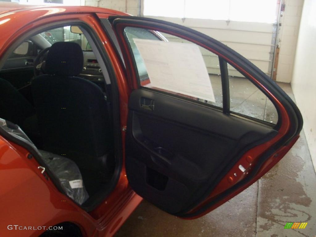 2010 Lancer GTS - Rotor Glow Orange Metallic / Black photo #19