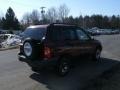 2003 Wildfire Red Chevrolet Tracker 4WD Hard Top  photo #4