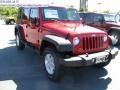 2010 Flame Red Jeep Wrangler Unlimited Sport 4x4  photo #4