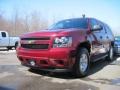 2010 Red Jewel Tintcoat Chevrolet Suburban LS 4x4  photo #1