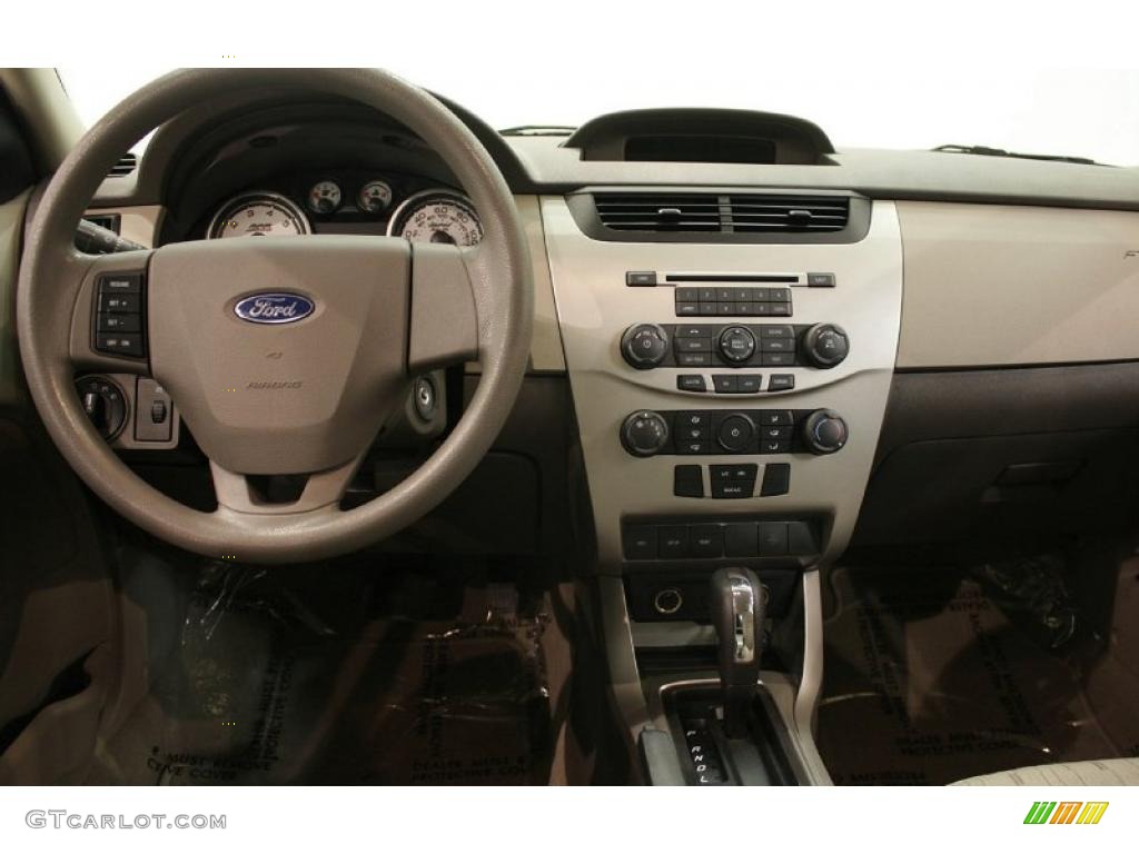 2009 Focus SE Sedan - Light Ice Blue Metallic / Medium Stone photo #19