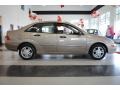 2003 Arizona Beige Metallic Ford Focus SE Sedan  photo #9