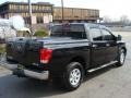 2004 Galaxy Black Nissan Titan LE Crew Cab 4x4  photo #3