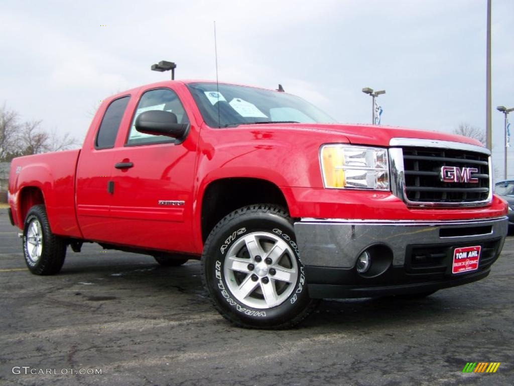 2010 Sierra 1500 SLE Extended Cab 4x4 - Fire Red / Light Titanium/Ebony photo #1