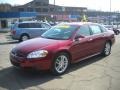 2009 Victory Red Chevrolet Impala LTZ  photo #16