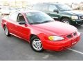 2003 Victory Red Pontiac Grand Am SE Sedan  photo #3