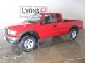 2002 Radiant Red Toyota Tacoma V6 TRD Xtracab 4x4  photo #1