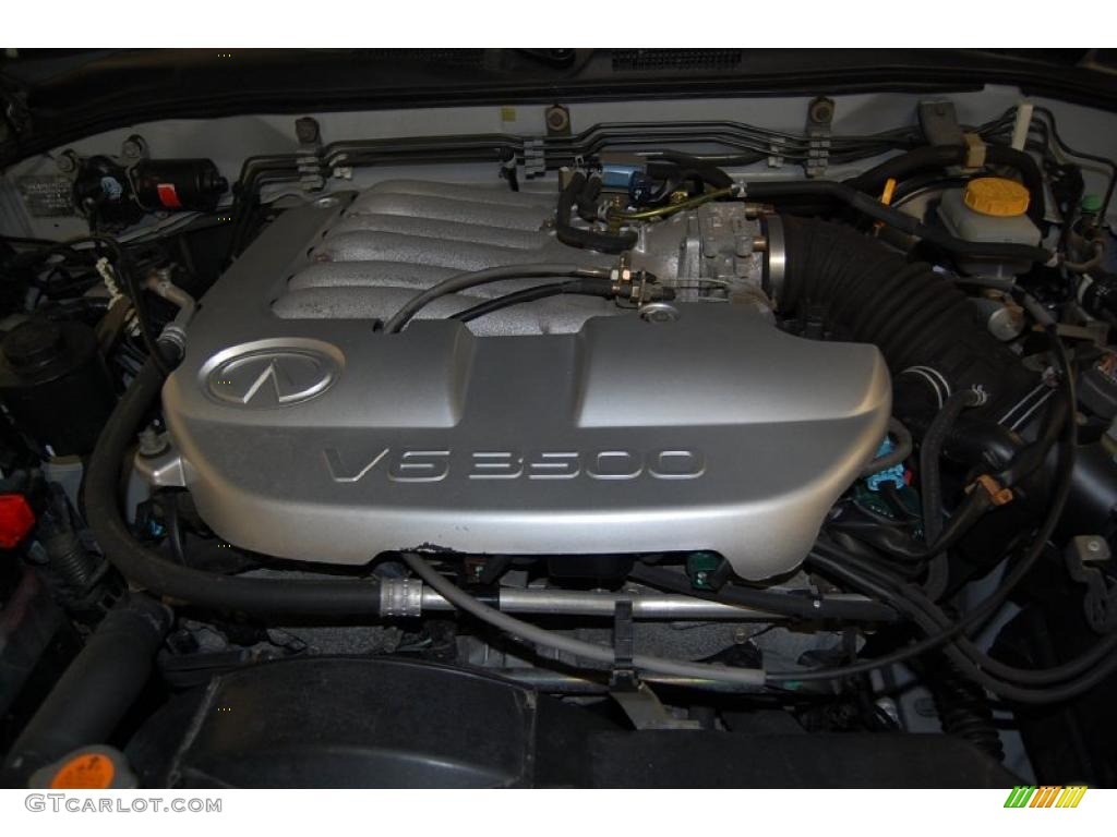 2002 QX4  - Brilliant Silver Metallic / Graphite photo #16