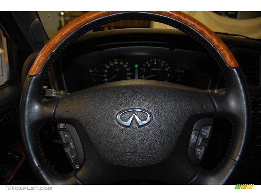 2002 QX4  - Brilliant Silver Metallic / Graphite photo #29