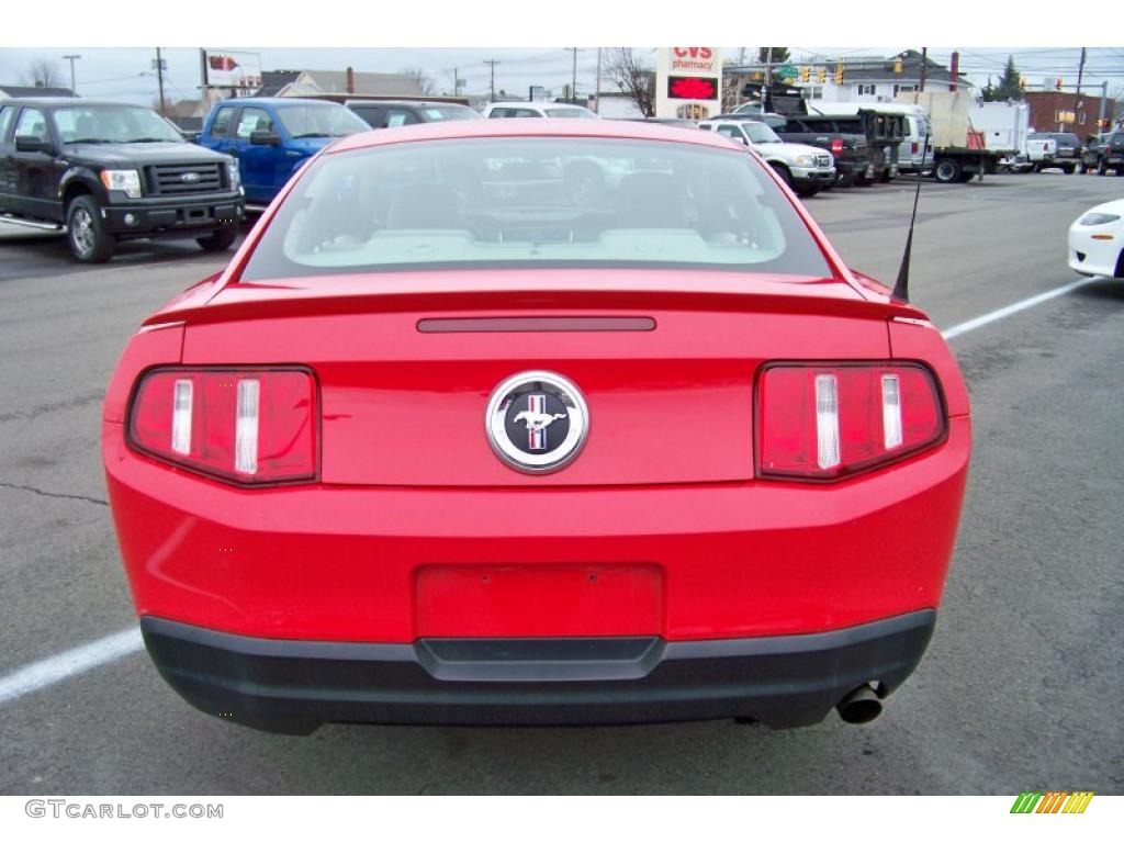 2010 Mustang V6 Premium Coupe - Torch Red / Stone photo #6