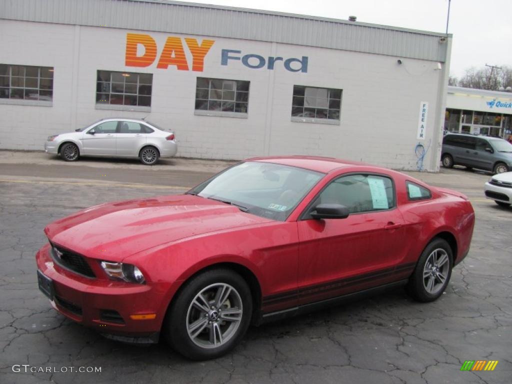 2010 Mustang V6 Premium Coupe - Red Candy Metallic / Saddle photo #1