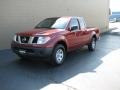 2006 Red Brawn Nissan Frontier XE King Cab  photo #2