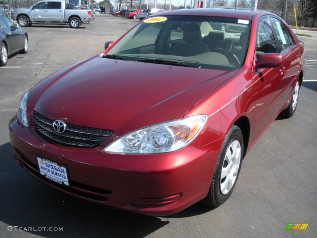 2002 Camry LE - Salsa Red Pearl / Taupe photo #1
