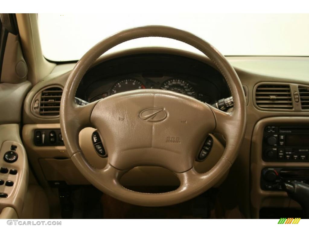 1998 Intrigue GL - Gold Metallic / Beige photo #11