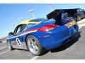 2009 Blue/Yellow/Red/Grey Porsche Cayman S Interseries  photo #8
