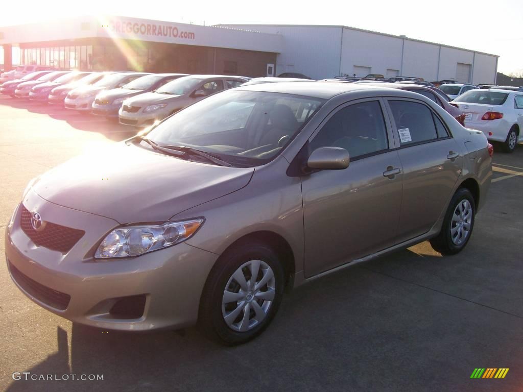 2010 Corolla LE - Desert Sand Metallic / Bisque photo #1