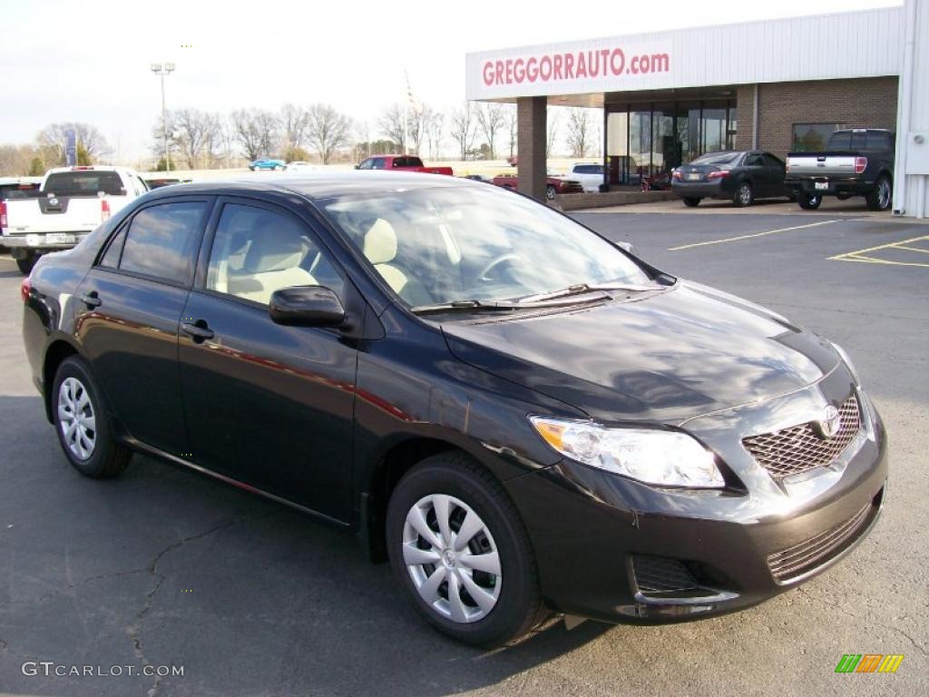 2010 Corolla LE - Black Sand Pearl / Bisque photo #1