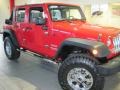 2010 Flame Red Jeep Wrangler Unlimited Sport 4x4  photo #4