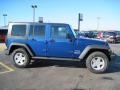 2010 Deep Water Blue Pearl Jeep Wrangler Unlimited Sport 4x4  photo #4