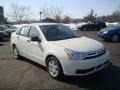 2010 White Suede Ford Focus SE Sedan  photo #1