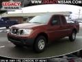 Red Brick 2010 Nissan Frontier XE King Cab