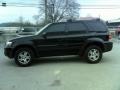 2006 Black Ford Escape Limited 4WD  photo #8