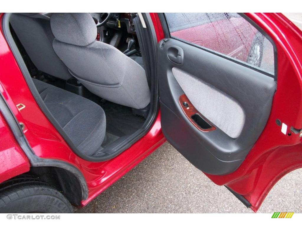2001 Sebring LX Sedan - Inferno Red Tinted Pearlcoat / Dark Slate Gray photo #12