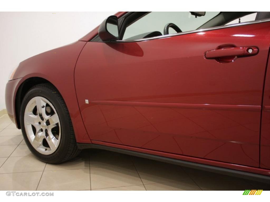 2009 G6 Sedan - Performance Red Metallic / Ebony photo #22