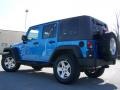 2010 Surf Blue Pearl Jeep Wrangler Unlimited Islander Edition 4x4  photo #7