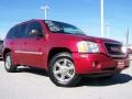 2002 Magnetic Red Metallic GMC Envoy SLT 4x4  photo #1