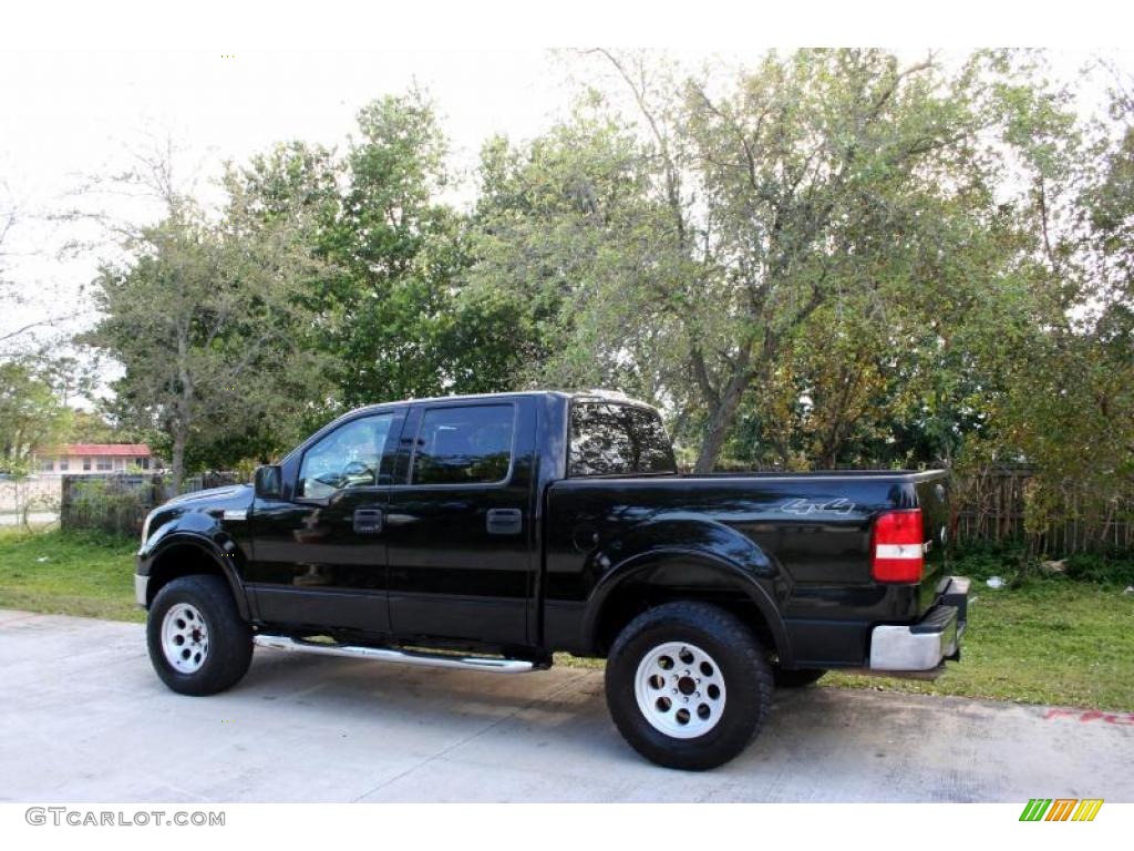 2004 F150 Lariat SuperCrew 4x4 - Black / Black/Medium Flint photo #5